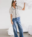 Top paired with denim