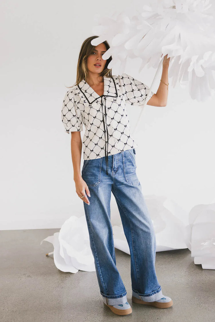 Top paired with denim