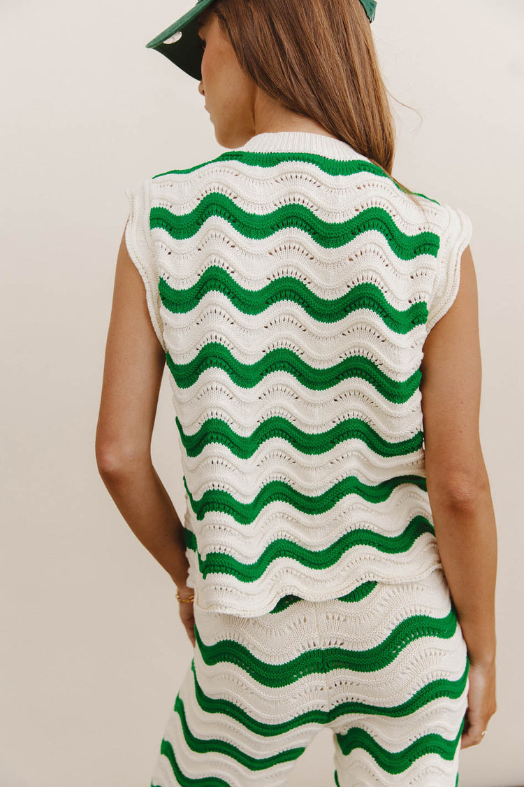 Plain color top in striped green