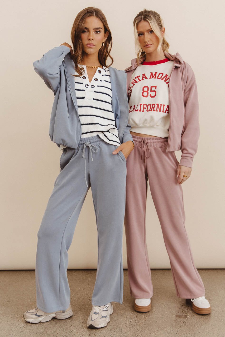 Pants in mauve paired with a hoodie in mauve