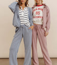 Pants in mauve paired with a hoodie in mauve