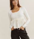 Peplum top in ivory