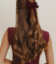 Velvet bow in wine color