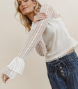white top with flare sleeves