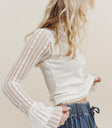 white top with lace sleeves