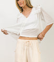 lace detail on ivory top