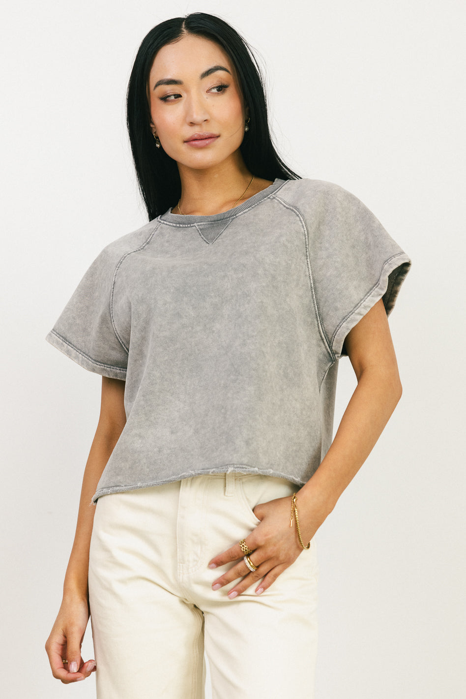 round neckline on gray shirt