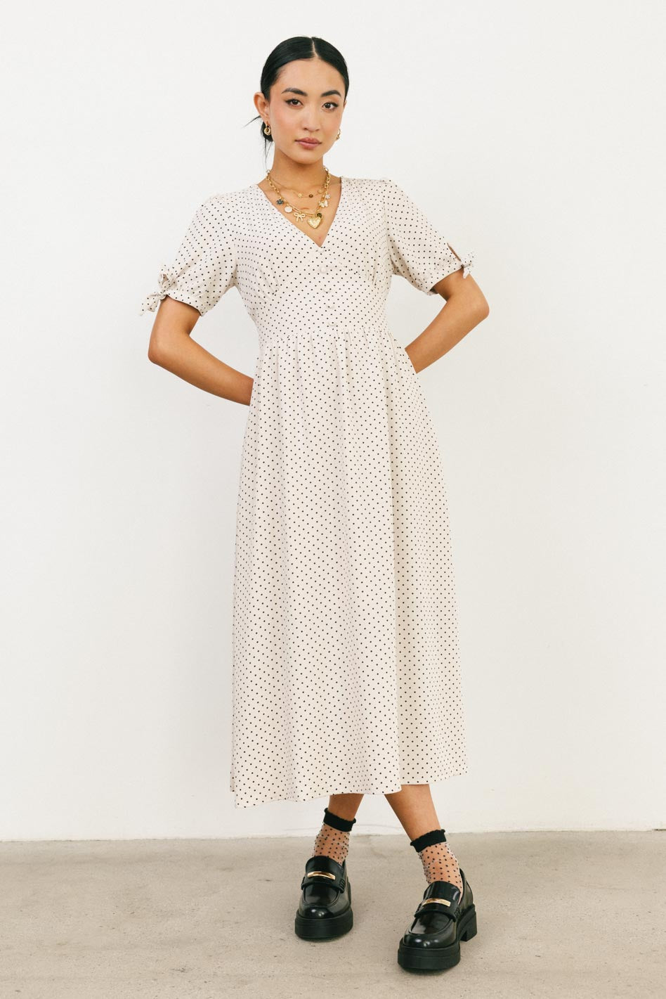 Polka dots dress in cream