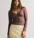 twisted detail on chest of mauve top