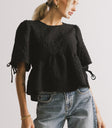 textured black peplum top