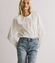 white button up blouse