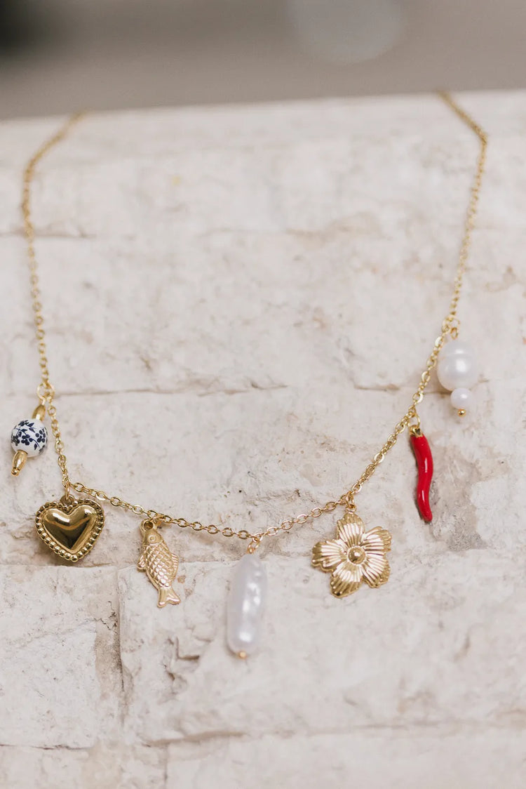 Charms gold necklace