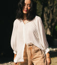 oversized cream button up