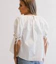 Plain color top in white